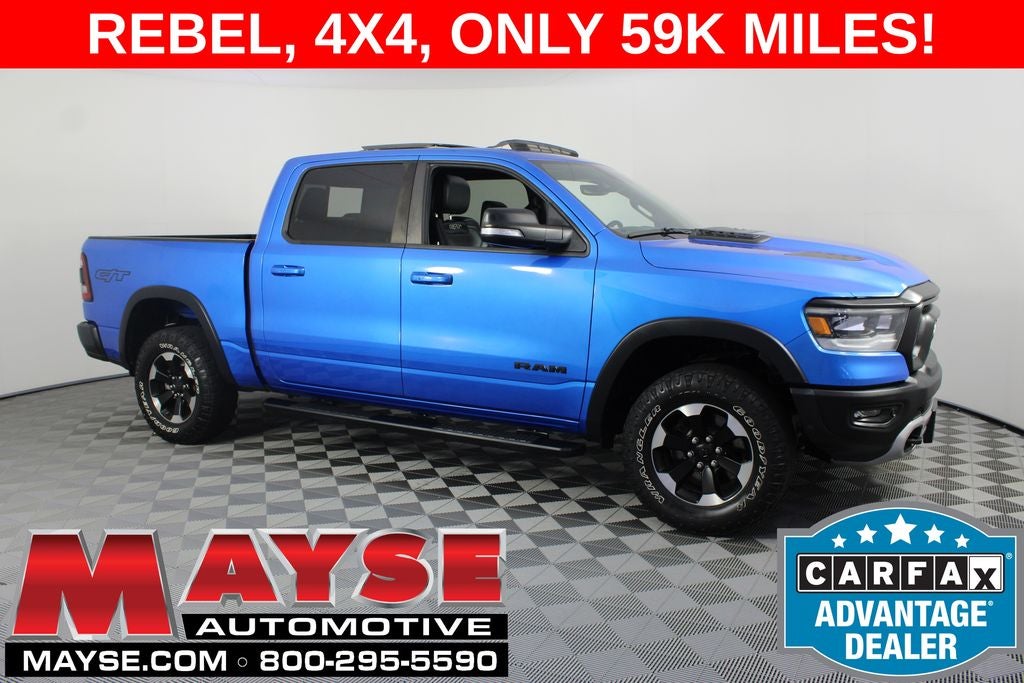 2022 RAM 1500 Rebel in Hydro Blue Pearlcoat — front three-quarter view