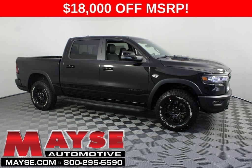 2026 RAM 1500 Rebel in Diamond Black Crystal Pearl-Coat Exterior Paint — front three-quarter view