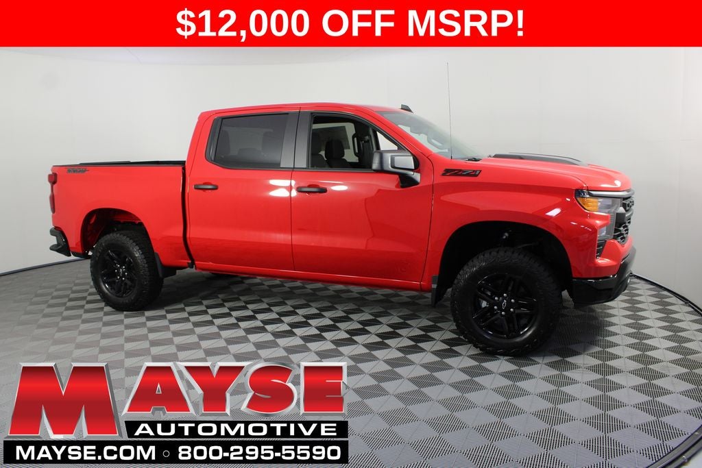 2026 Chevrolet Silverado 1500 Custom Trail Boss in Red Hot — front three-quarter view