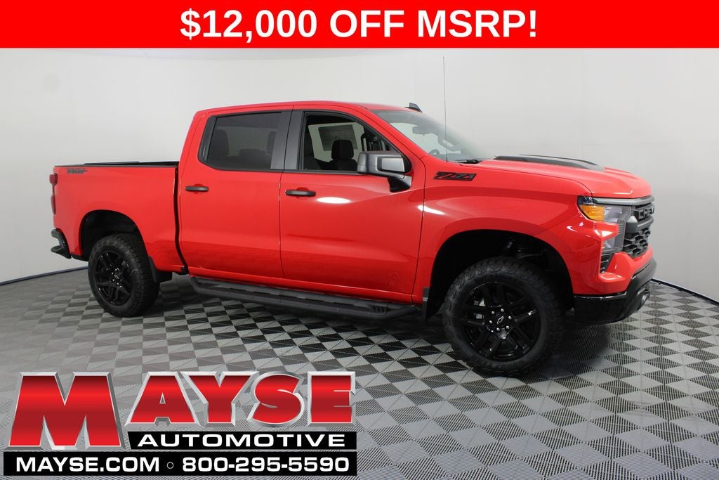 2026 Chevrolet Silverado 1500 Custom Trail Boss in Red Hot — front three-quarter view
