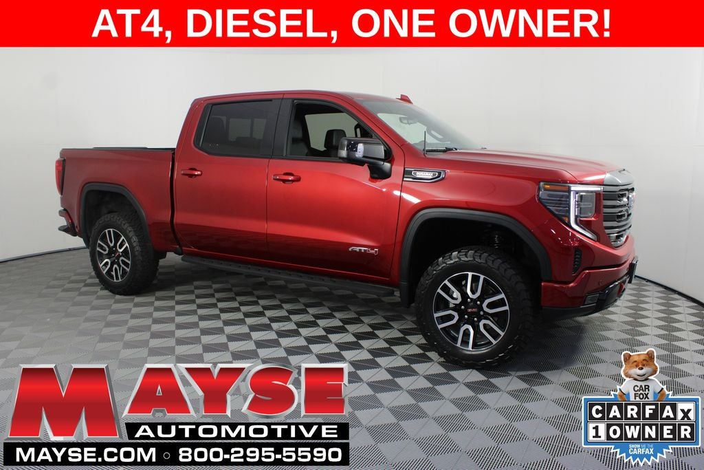 2024 GMC Sierra 1500 AT4 in Volcanic Red Tintcoat — front three-quarter view