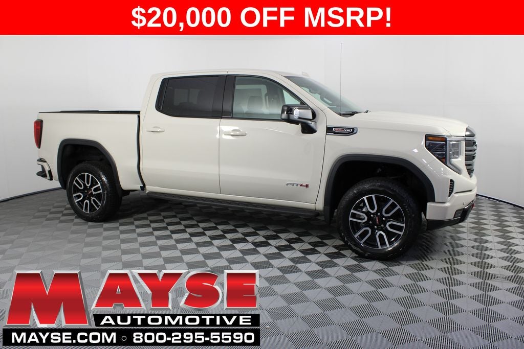 2026 GMC Sierra 1500 AT4 in Coastal Dune — front three-quarter view