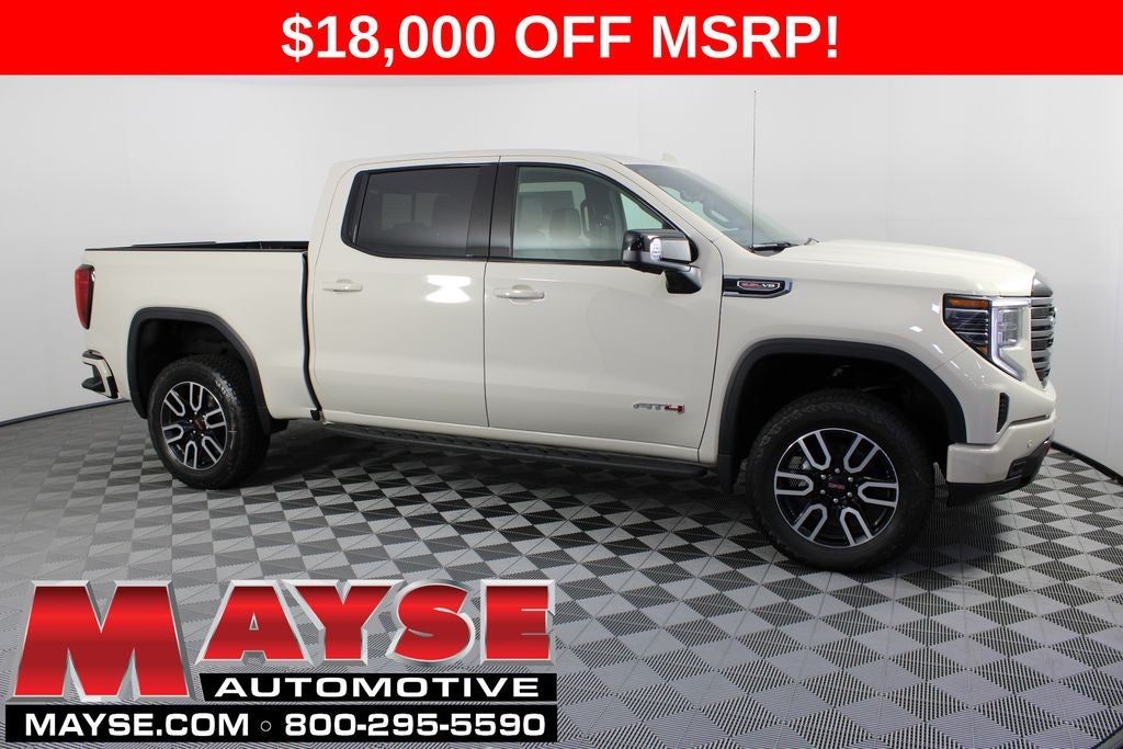 2026 GMC Sierra 1500 AT4 in Coastal Dune — front three-quarter view