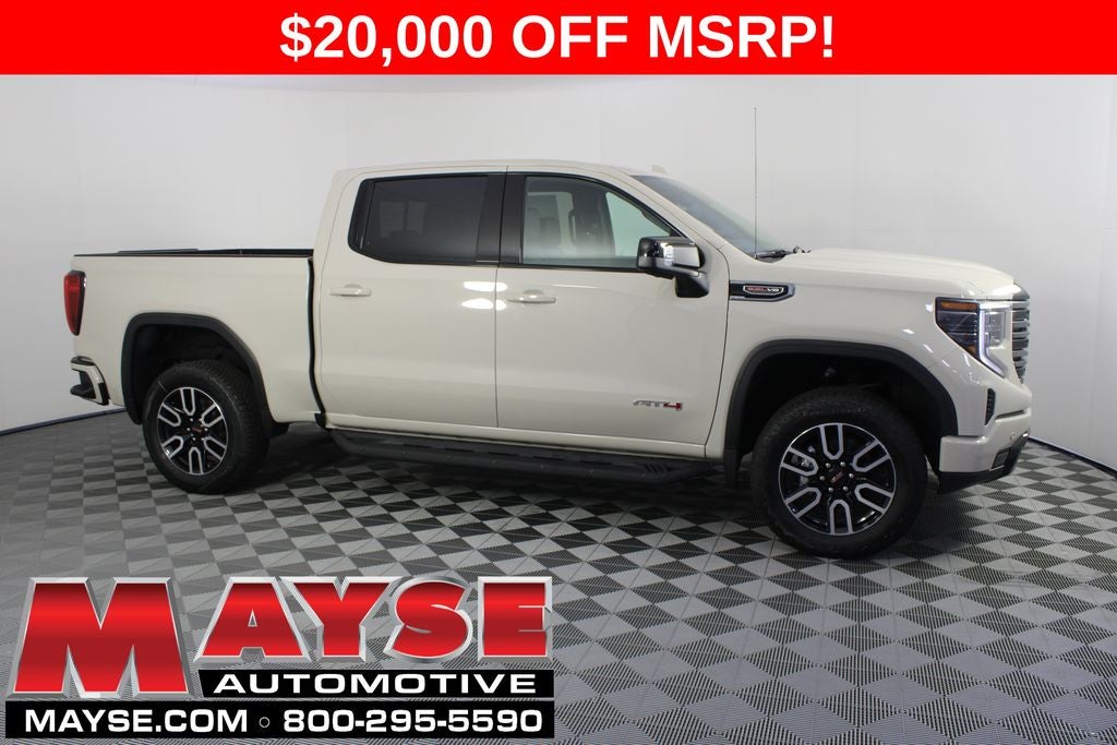 2026 GMC Sierra 1500 AT4 in Coastal Dune — front three-quarter view